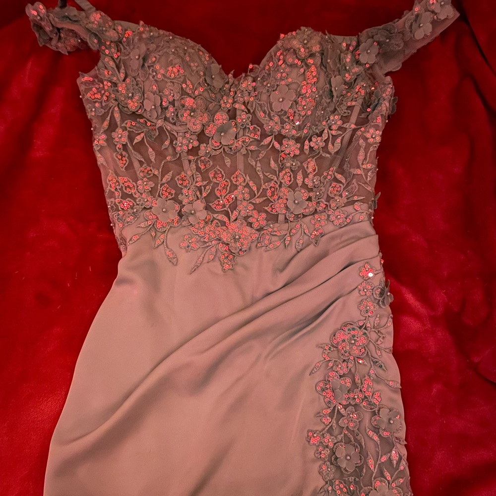 Off the shoulder, light blue with iridescent sparkles. From affair to remember